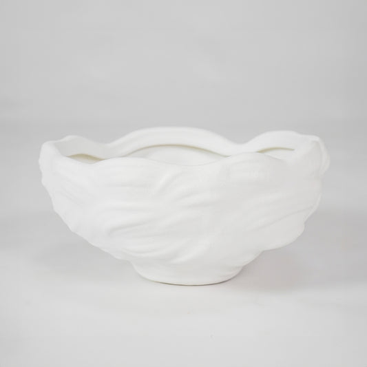 White textured ceramic bowl for elegant dining table placement and modern indoor decor styling centerpiece accent.