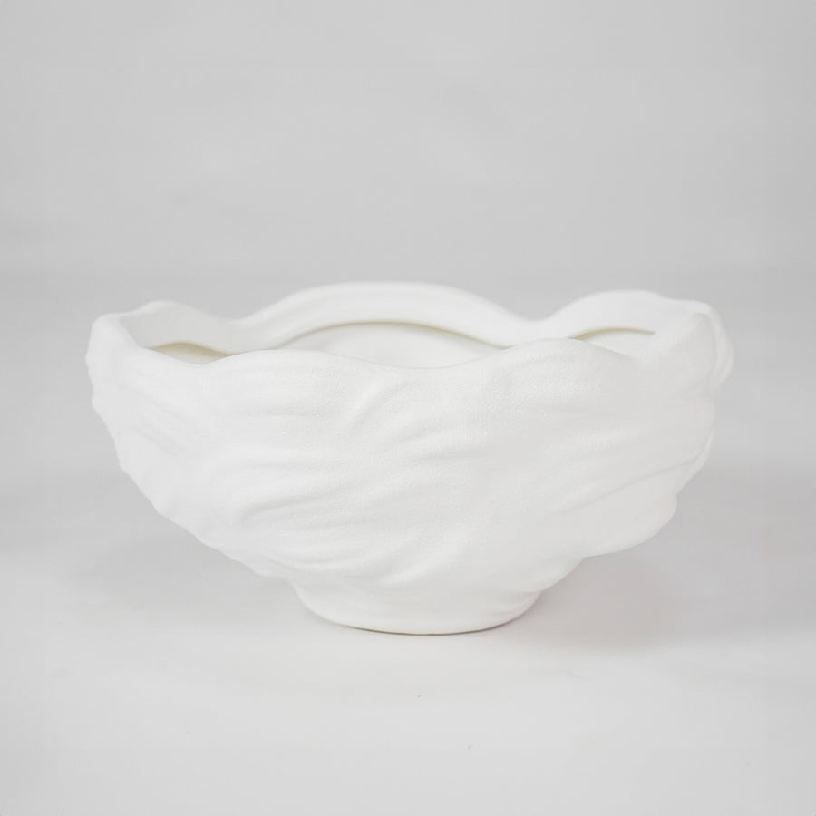 White textured ceramic bowl for elegant dining table placement and modern indoor decor styling centerpiece accent.