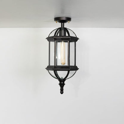Black metal hanging lantern light turned off on white background showcasing vintage shape and elegant outdoor lighting style.