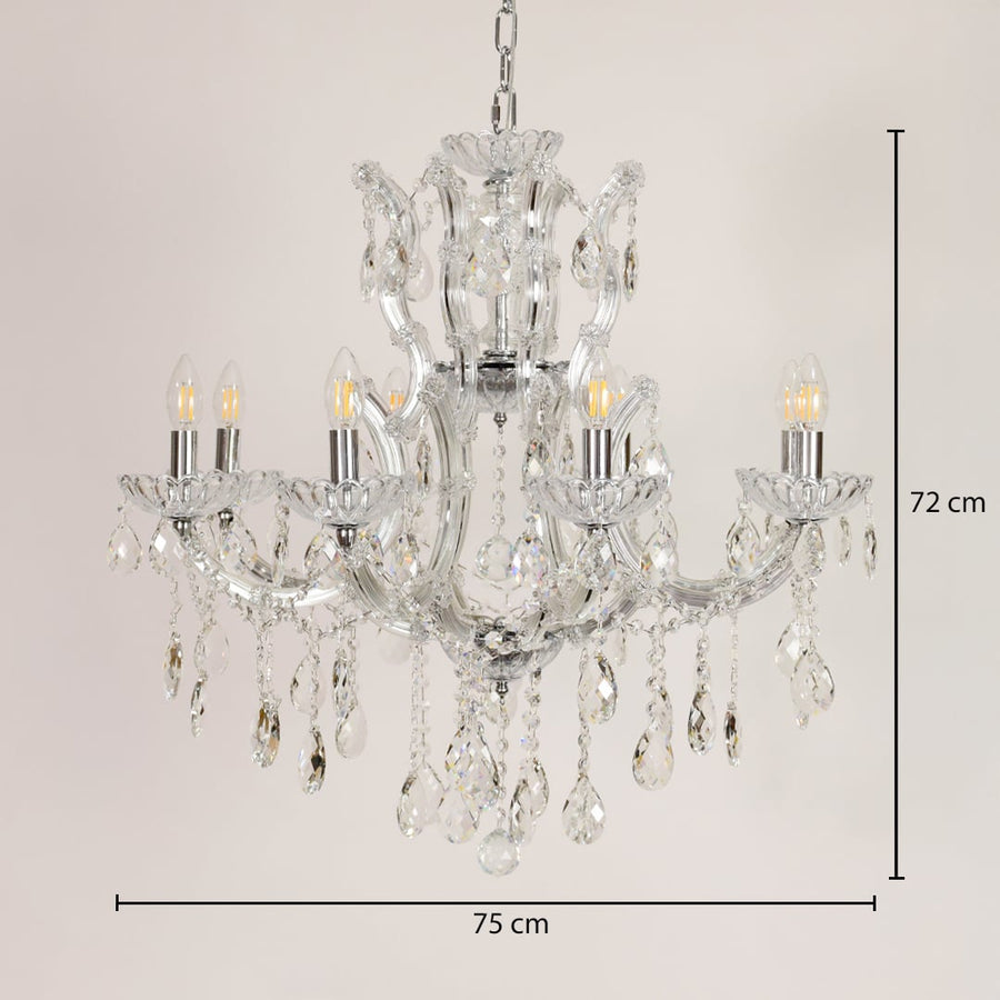 Crystal chandelier with chrome accents measuring 75 cm wide and 72 cm tall ideal for living and dining lighting.