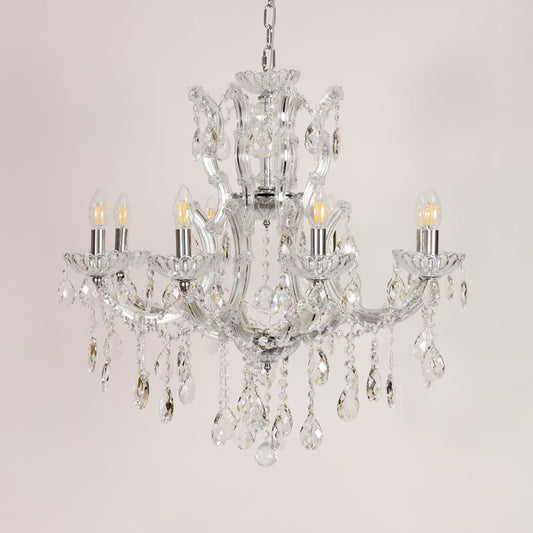 Crystal glass chandelier with chrome finish shown on white background for stylish modern home decor inspiration.