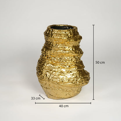 Gold metal floor vase 50 cm height 40 cm width ideal for living room corner and entryway decor.
