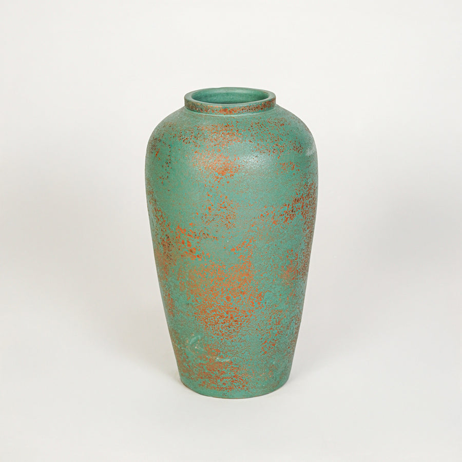 White background image of green ceramic decorative vase for elegant tabletop decor styling with textured finish.