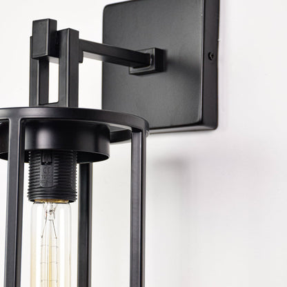 Closeup image of black metal outdoor wall light with clear glass shade for modern exterior wall decor.