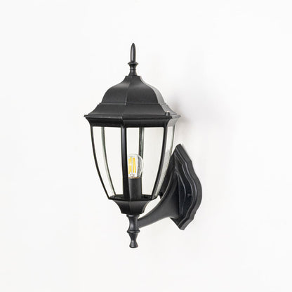 Black metal outdoor wall lantern shown unlit on white background highlighting classic design glass panels and exterior Decor appeal.