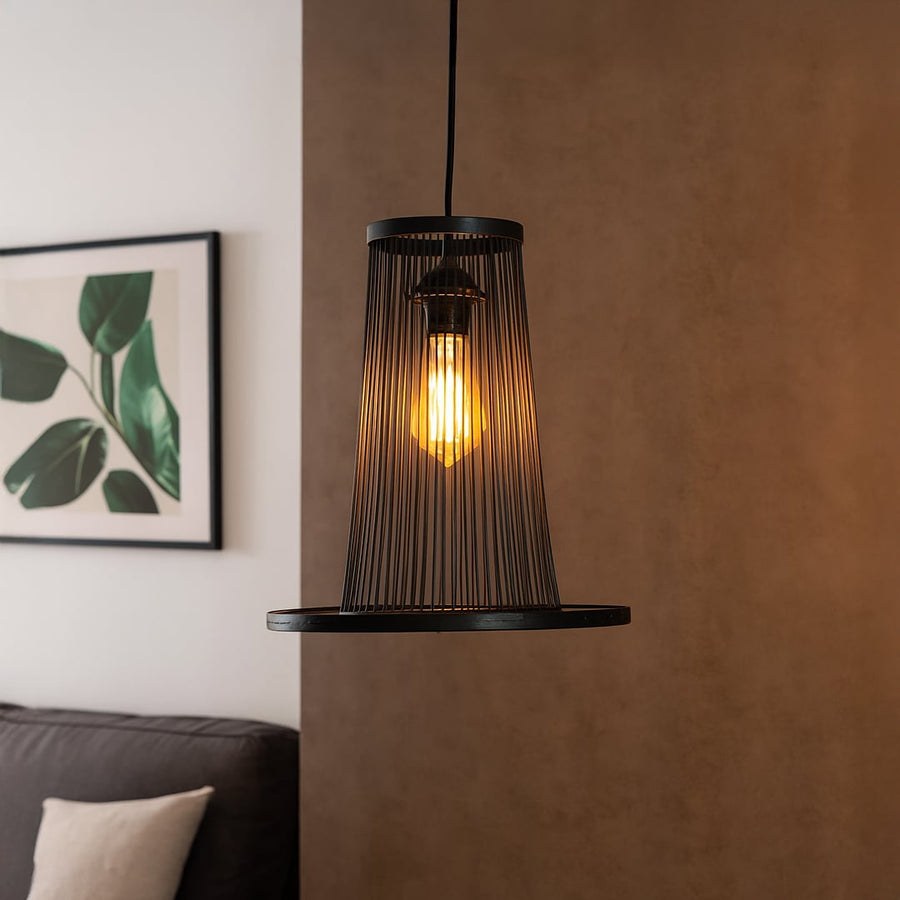 Tapered black wire pendant light adding industrial charm and soft illumination to elevate modern home interiors.