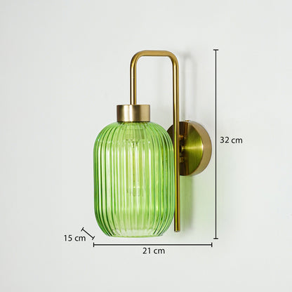 Gold metal wall light with green ribbed glass shade sized 32 cm height 21 cm width and 15 cm depth ideal for modern wall decor.