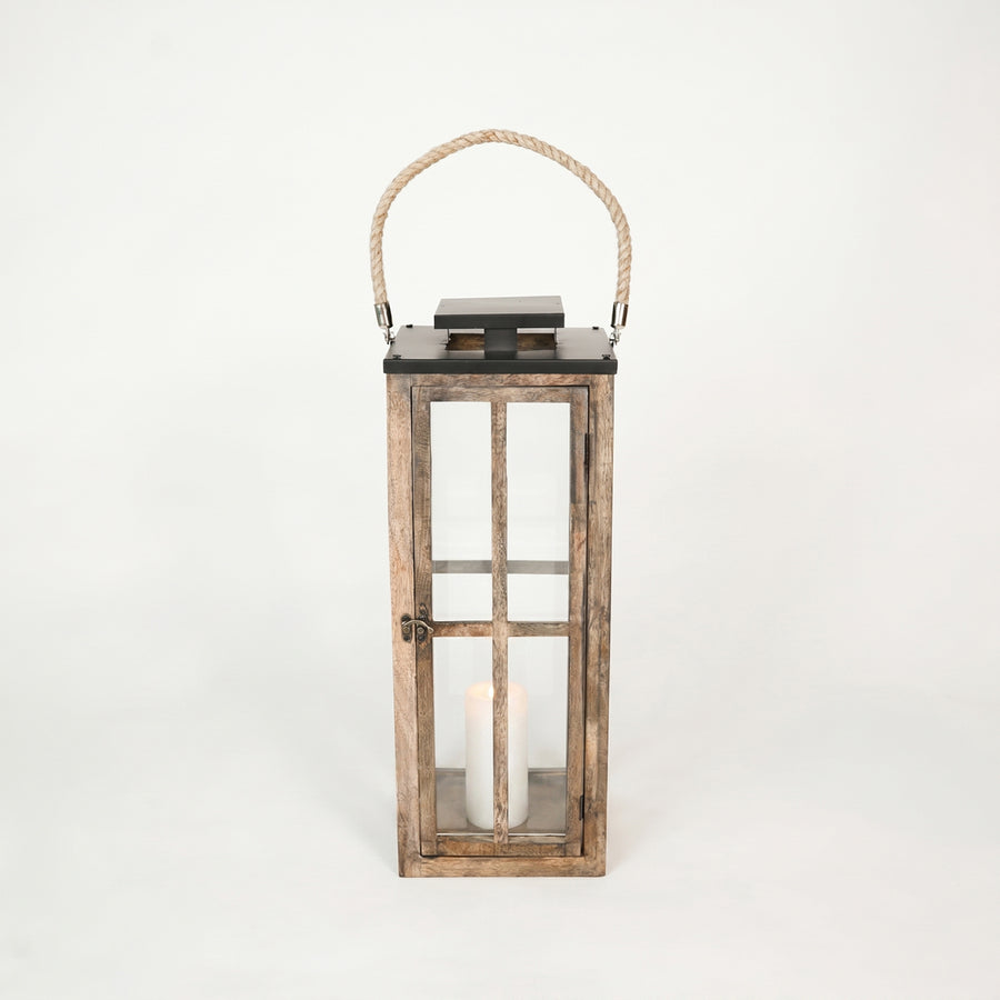 Wooden lantern with a candle inside on a white background