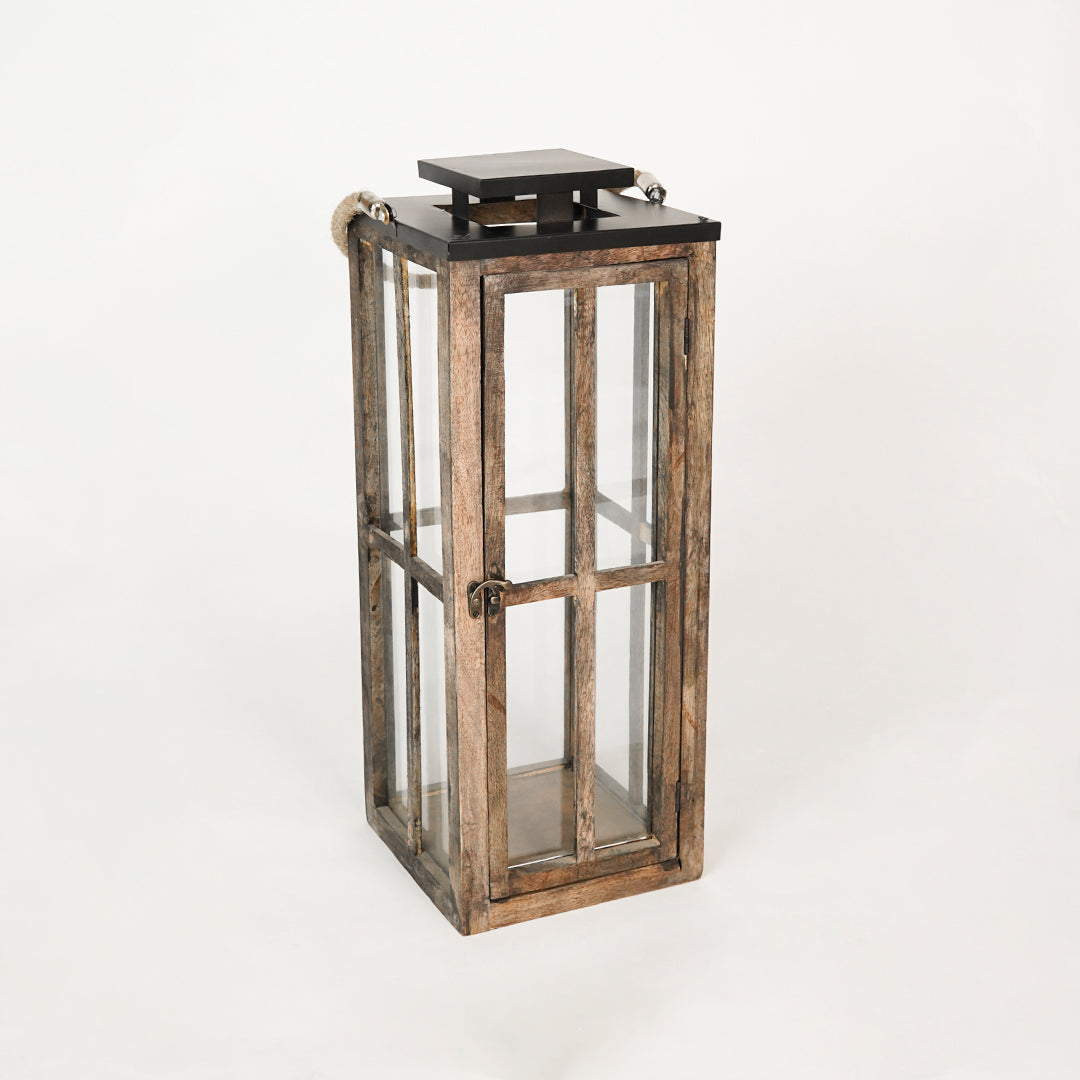 Wooden lantern with glass panels on a white background