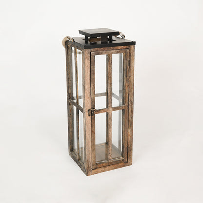 Wooden lantern with glass panels on a white background