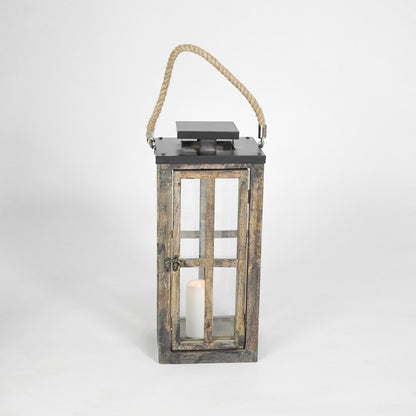 Wooden lantern with a candle inside on a white background