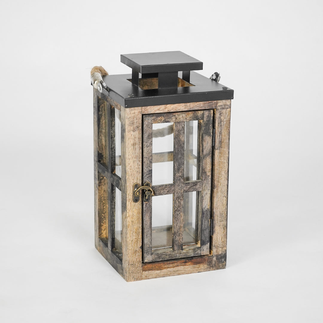 Wooden lantern with glass panels on a white background