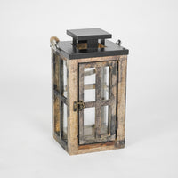 Wooden lantern with glass panels on a white background