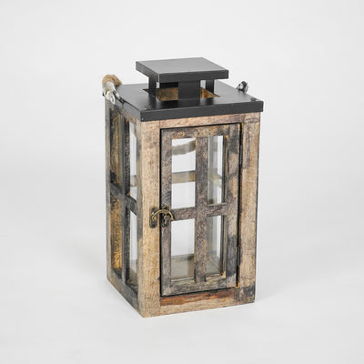 Wooden lantern with glass panels on a white background