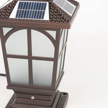 Closeup of solar outdoor lantern top displaying integrated solar panel decorative roof design and robust exterior construction.