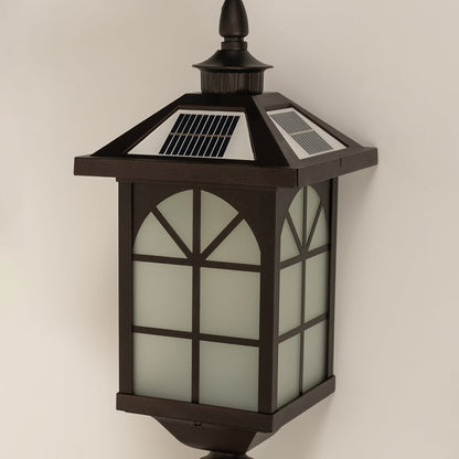 A closeup of the bronze solar lantern showing the frosted panel glow window frame pattern and smooth metal finish highlighting the lantern’s classic outdoor design features.