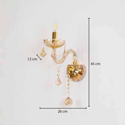 Golden wall light with crystal drops size 45cm height 26cm width 12cm depth displayed with measurements.