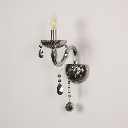 Wall light with chrome metal frame and dark crystal accents displayed on a white background for clear refined product detail.