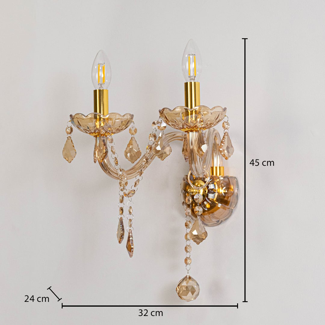 Crystal wall light with glass shade and hanging crystals size 25cm height 26cm width 12cm depth displayed with measurements.