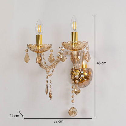 Crystal wall light with glass shade and hanging crystals size 25cm height 26cm width 12cm depth displayed with measurements.