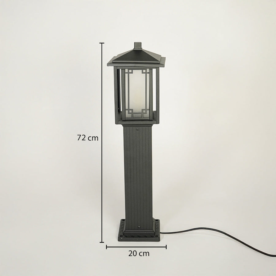 Classic outdoor pillar light with black metal body and framed glass enclosure on neutral background 72 cm height 20 cm width ideal for gate or garden lighting.