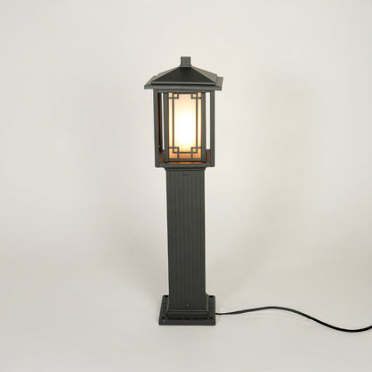 Black outdoor garden pole light with classic lantern design on neutral background ideal for pathway lawn or driveway lighting.
