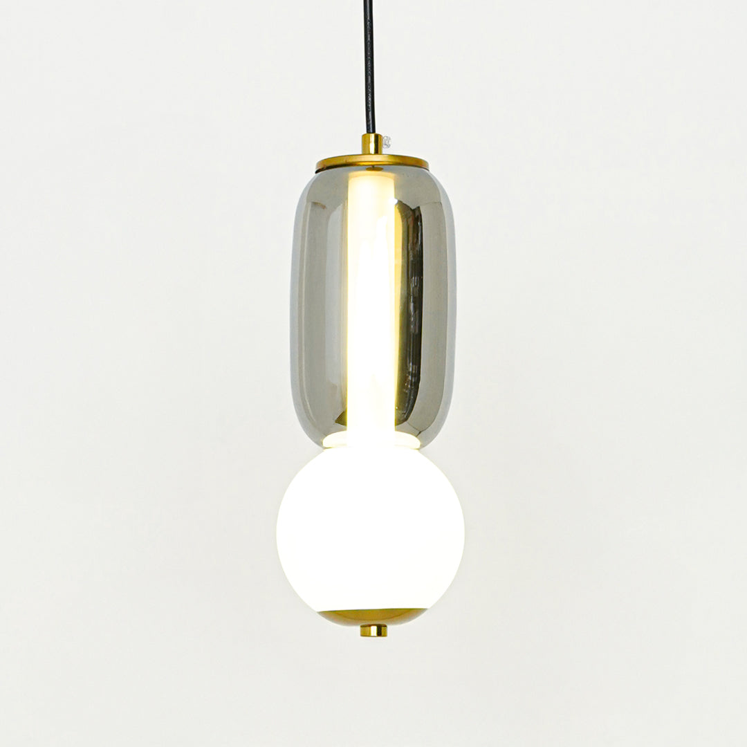 White glass and gold metal pendant light designed for elegant dining room and modern home decor.