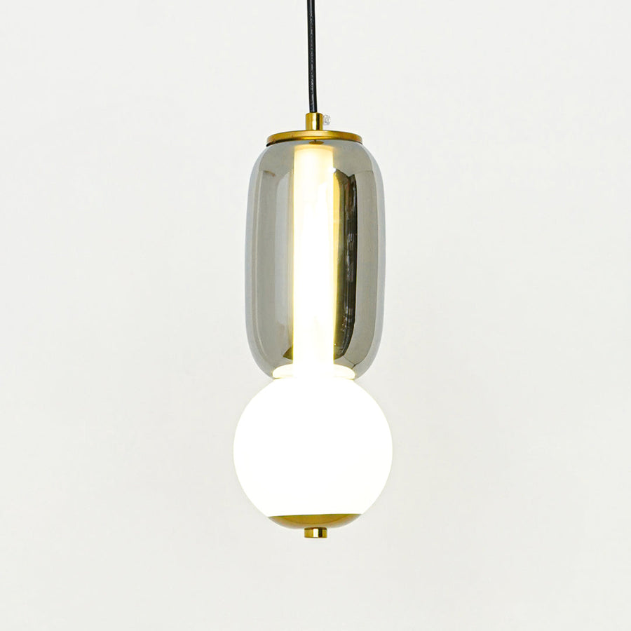White glass and gold metal pendant light designed for elegant dining room and modern home decor.