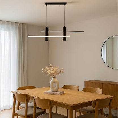 Black sculptural pendant chandelier with curved LED bars hanging above a dining area creating a modern artistic focal element that enhances the clean interior setting.