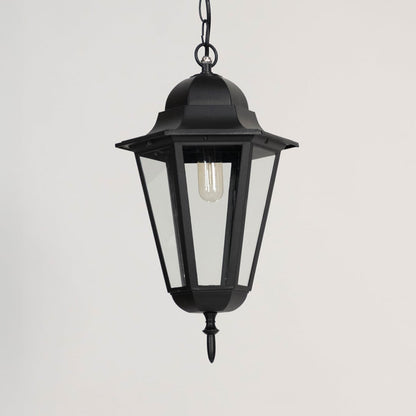 Black outdoor hanging lantern displayed off on white background showing elegant geometric metal design.