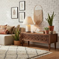 Contemporary cream table lamp featuring a textured cylindrical body wide shade and wooden base providing warm accent illumination for stylish interior home decor.