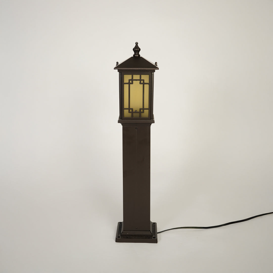 Vintage style outdoor pole light with decorative lantern top on neutral background ideal for garden or patio lighting.