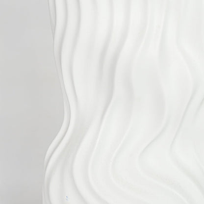 Closeup white textured ceramic vase surface detail modern decorative flower vase for table shelf console decor.
