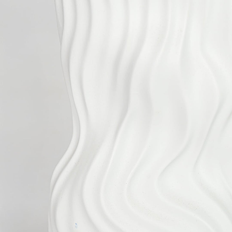 Closeup white textured ceramic vase surface detail modern decorative flower vase for table shelf console decor.