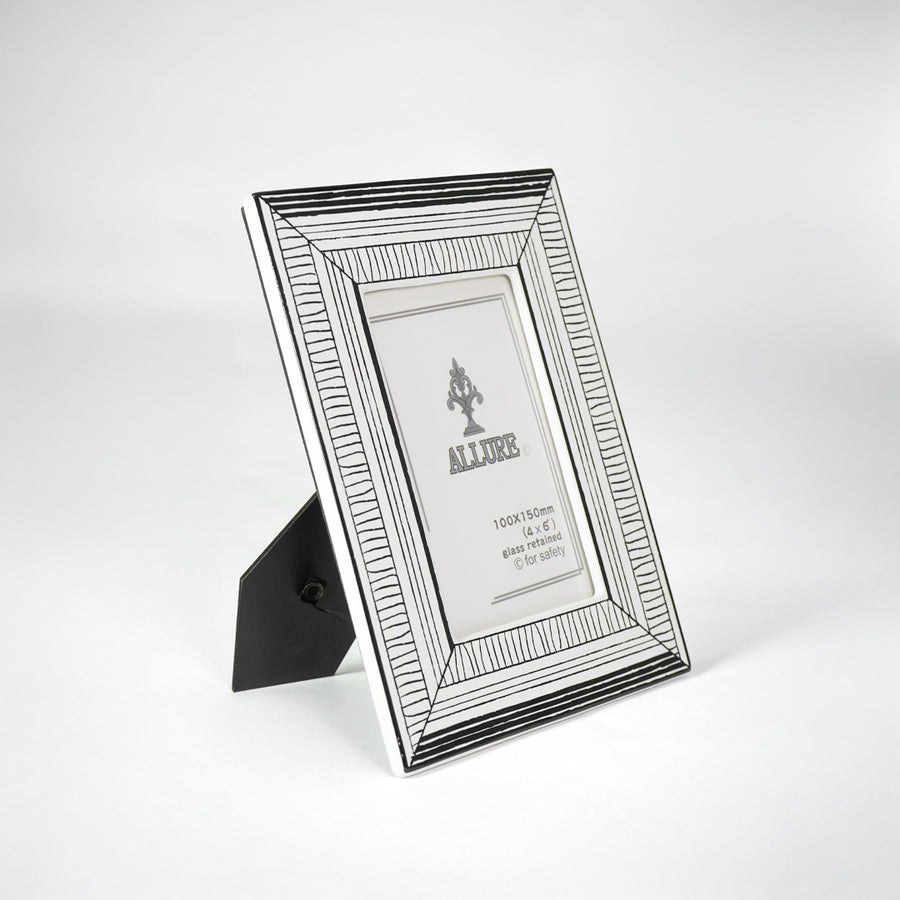 Modern silver picture frame for stylish console table placement and elegant living room decor styling accent.