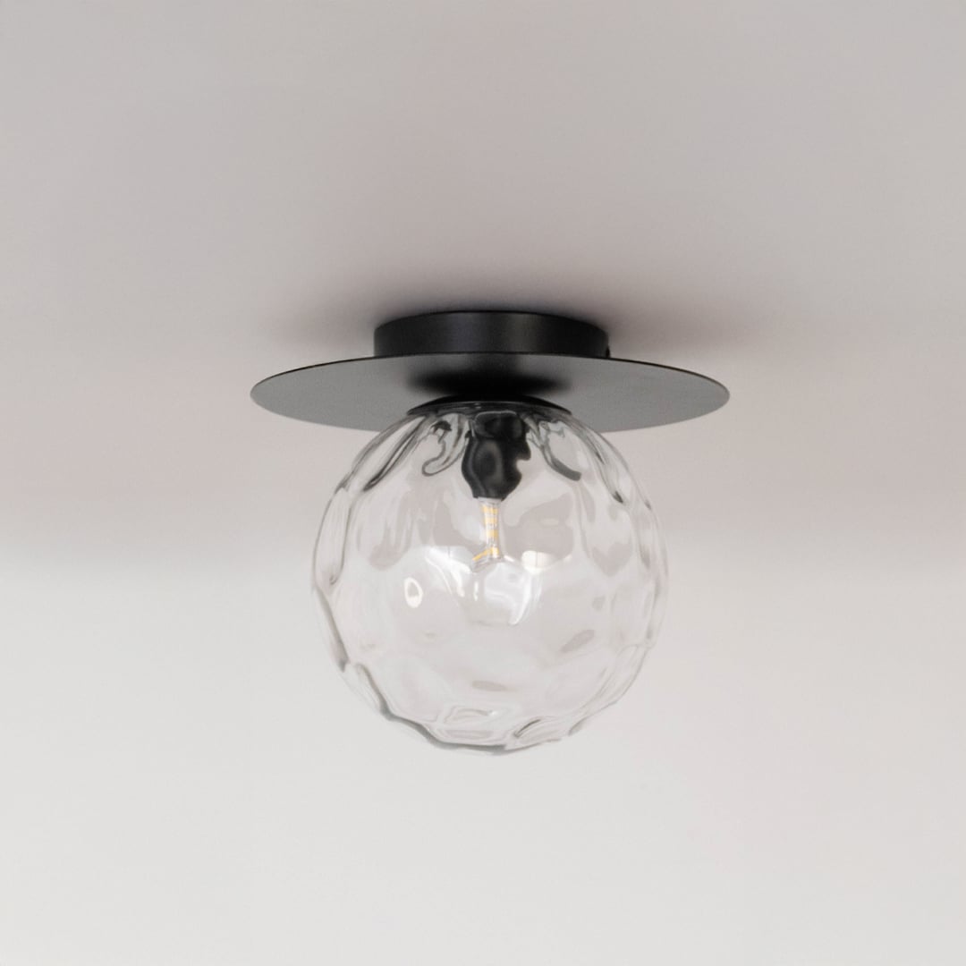 Black ceiling light with textured glass globe in off mode displayed on clean white background for modern ceiling decor.