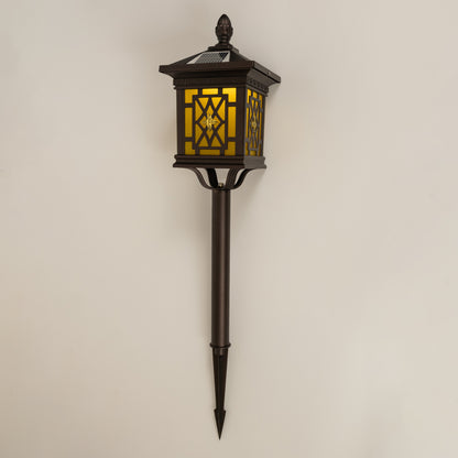 Vintage black outdoor garden light with warm glowing panels for stylish exterior decor use.