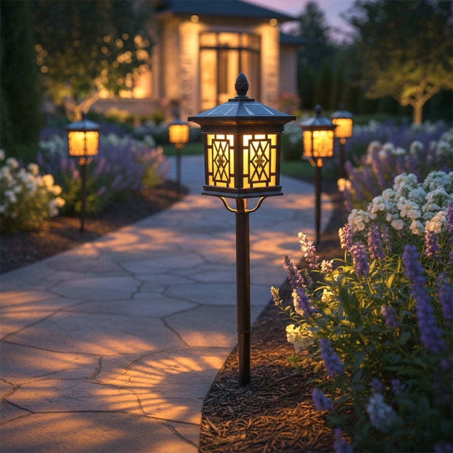 Black solar outdoor pathway lights with warm glow styled along garden walkway for elegant decor ambiance.