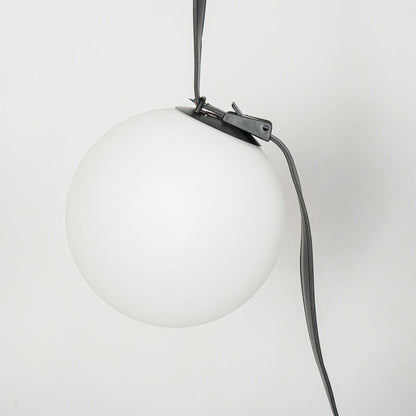 Detailed view of white globe glass pendant light showcasing premium finish and modern styling.