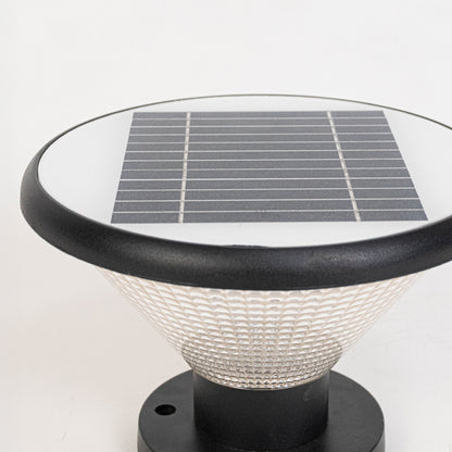 Closeup of black solar outdoor gate light with top solar panel for smart exterior decor styling.