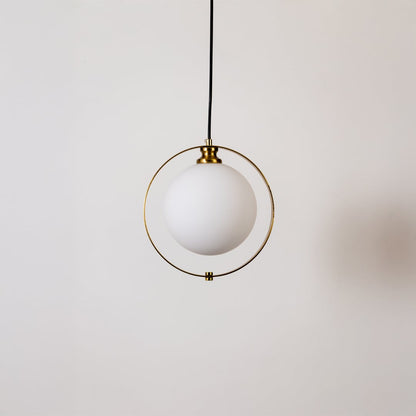 Pendant light with frosted globe and gold ring frame shown turned off on a white background displaying its clean minimal design.