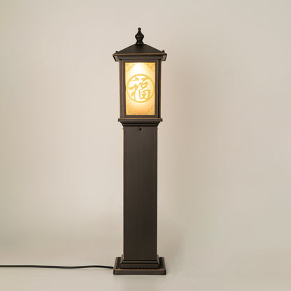 Vintage black outdoor garden light with glowing decorative panels for luxury exterior decor use.