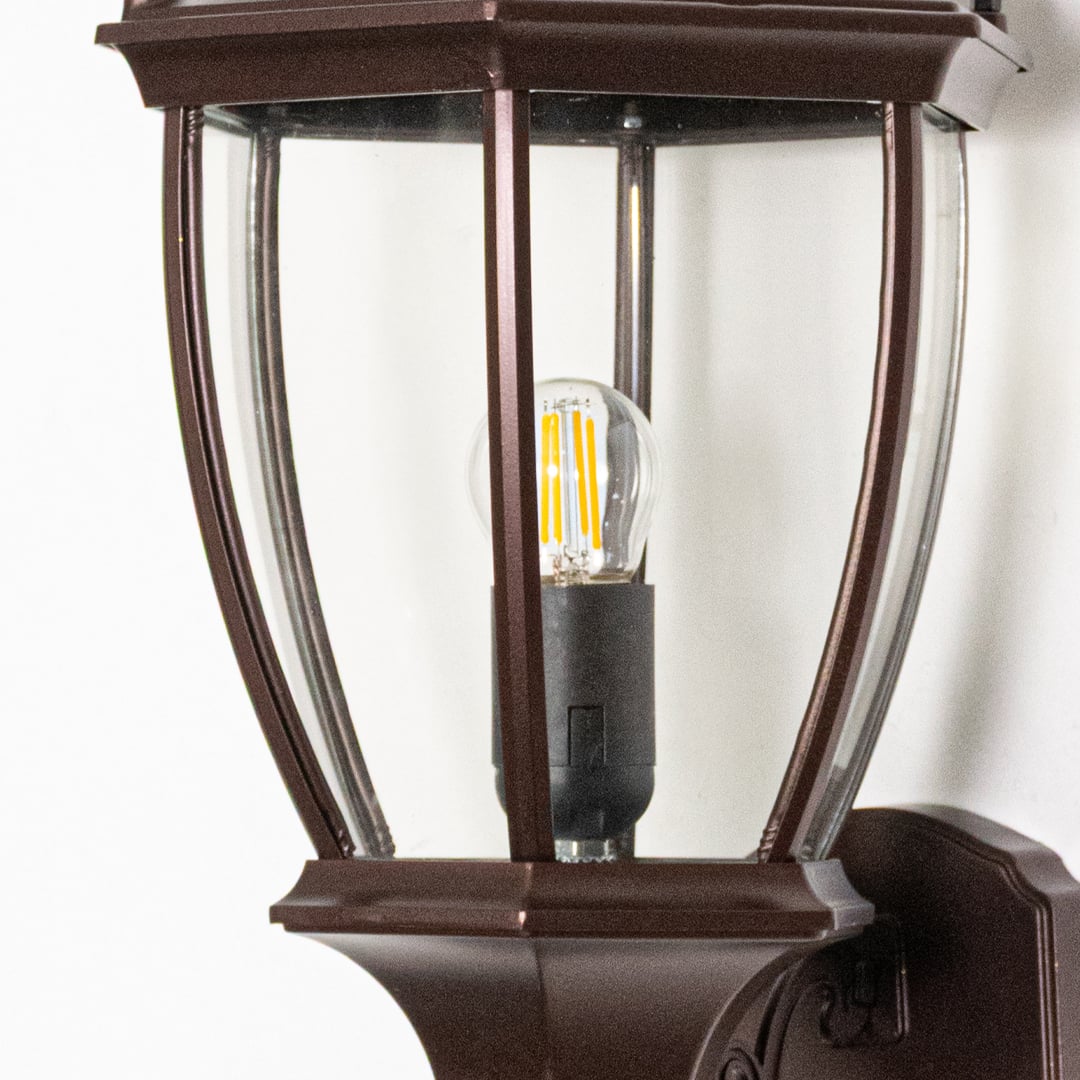 Closeup view of black metal Posse outdoor wall light displaying strong build smooth finish and modern styling for exterior wall placement.