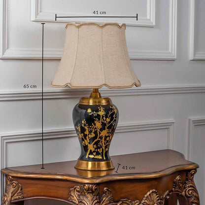 Black and gold patterned table lamp with beige shade and visible size 63cm height placed on carved console table with light off for luxury d‚àö¬¢¬¨√†¬¨√∂‚àö√á¬¨¬©cor.