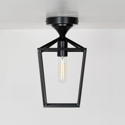 Outdoor black metal ceiling lantern with clear inner glass shown with lights off on a white background emphasizing its open frame design.