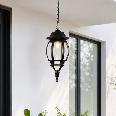 Traditional black metal outdoor hanging lantern for porch entrance garden and covered patio with warm ambient lighting.