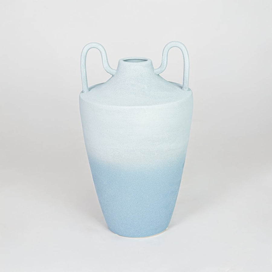Modern light blue decorative flower vase isolated clean background stylish ceramic vase for home decor display.