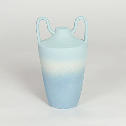 Modern light blue ceramic decorative vase with elegant curved handles and tapered silhouette for home styling.