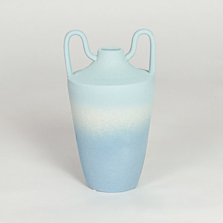 Modern light blue ceramic decorative vase with elegant curved handles and tapered silhouette for home styling.