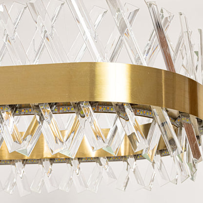 Closeup of gold metal chandelier highlighting the detailed crystal rods and polished metal band designed for elegant luxurious interior lighting.